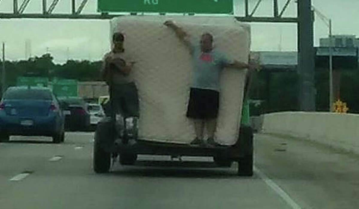 These guys who showed the internet how not to move : In May, commuters on Interstate 10 spotted two men using their bodies as human restraints to keep mattresses from falling out of a trailer. Witnesses estimated the vehicle was travelling at about 65 mph as it exited for Vance Jackson Road passing -- and disregarding -- a sign heeding drivers of deaths on Texas roads. Read more: San Antonians show how not to move furniture on a highway, social media loves it