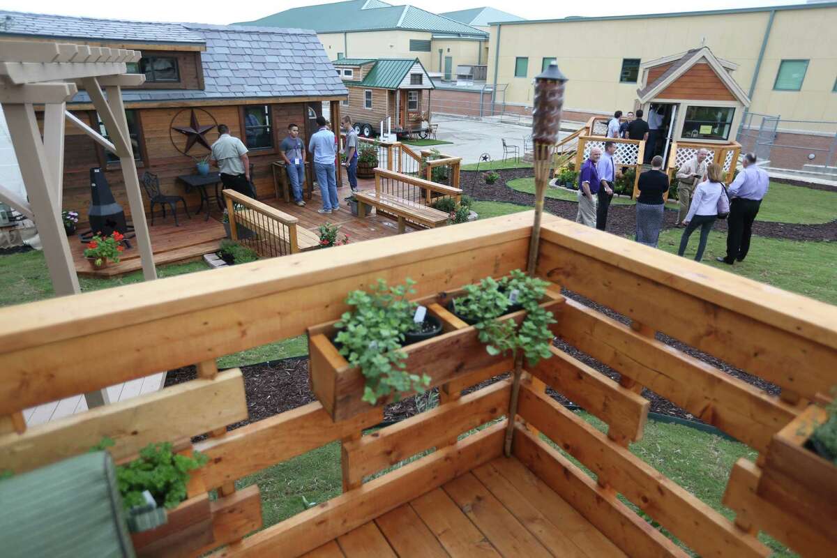 Teams of seniors at Construction Careers Academy show the tiny homes Wednesday morning, May 18, 2016 they built for the third annual Parade of Homes competition, sponsored by the Northside Independent School District. The homes are all fully-functional buildings that are 152 square feet or less.