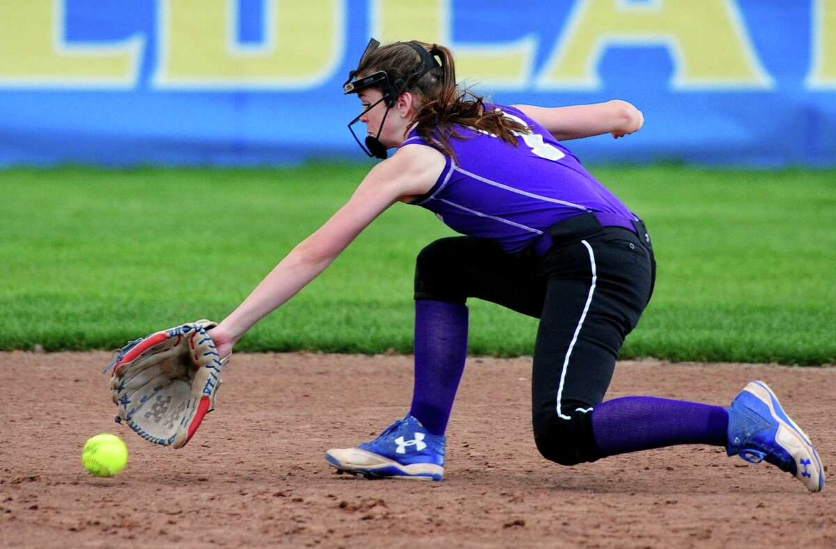 Westhill second baseman Olivia Butler stops a Seymour grounder during softball action in Seymour, Conn., on Thursday May 19, 2016.