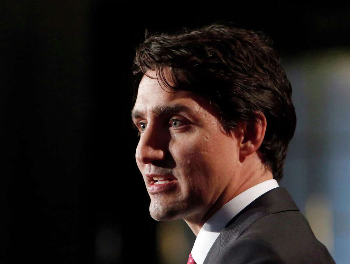 Trudeau Apologizes After Elbowing Lawmaker