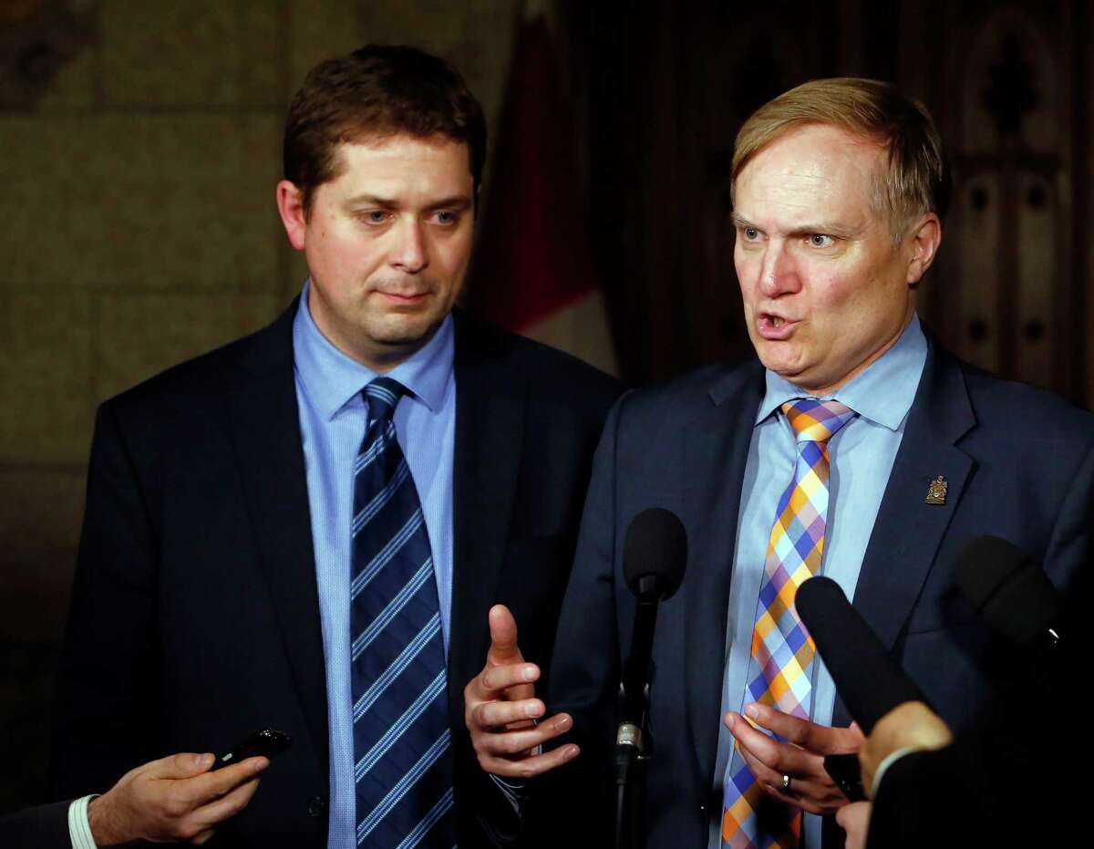 Trudeau apologizes after elbowing lawmaker