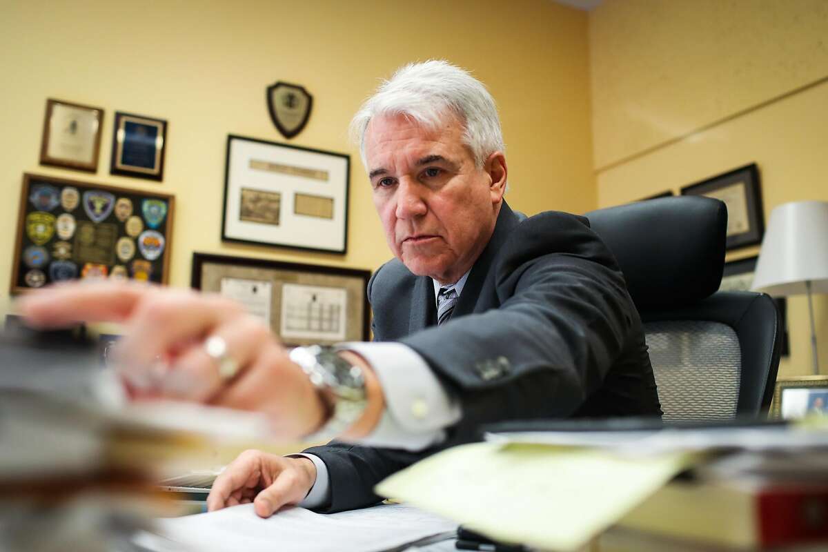 District Attorney George Gascon grabs paperwork while working in his office at the Hall of Justice, in San Francisco, California, on Wednesday, May 18, 2016. District Attorney George Gascón joined representatives from the Police Department, the Human Rights Commission and the mayor’s office at a news conference to say bigotry in any form would not be tolerated in the city.