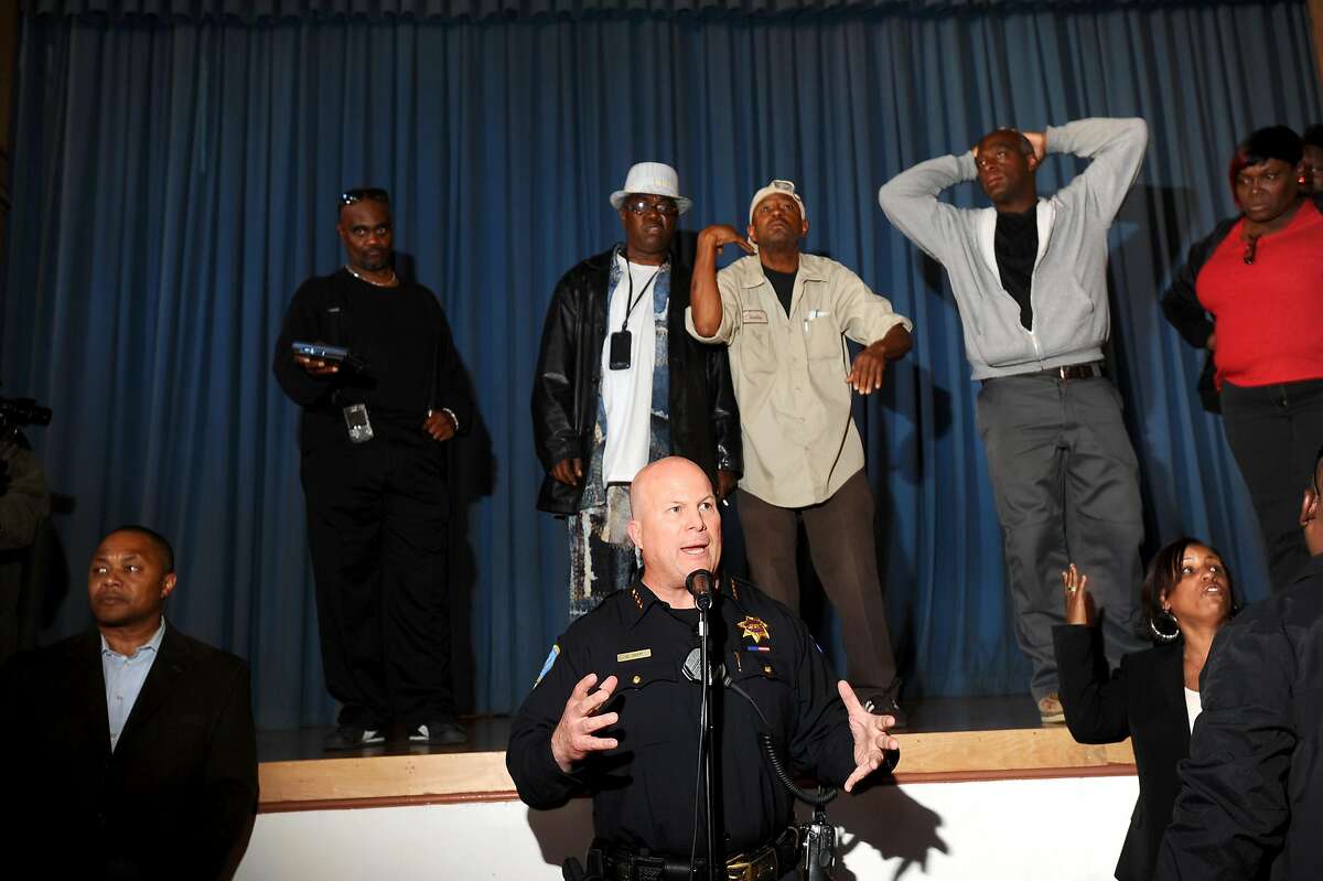 San Francisco Police Chief Greg Suhr addresses Bayview residents upset about the police shooting of Kenneth Wade Harding on Wednesday, July 20, 2011, in San Francisco. About 300 people gathered for the meeting which ended early following outbursts from some attendees.