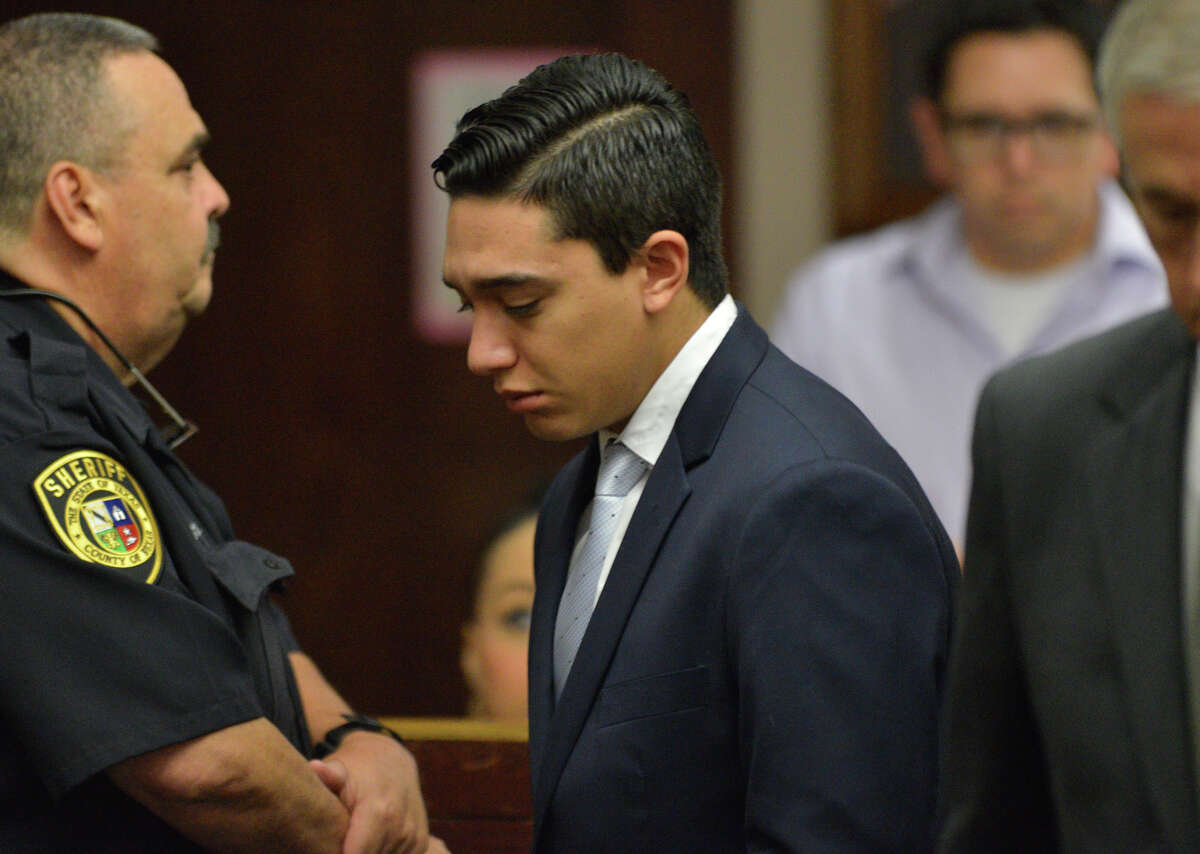 Antonio Flores walks back to the defense table during the punishment phase of his trial in which he was sentenced to two 10 year terms in the deaths of two persons while drag racing.