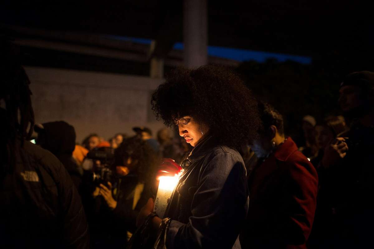 Hannah Wodaje, president of SF State's Black Student Union, attends a vigil for a 27-year-old woman shot and killed by a San Francisco police sergeant earlier in the day on Thursday, May 19, 2016, in San Francisco.