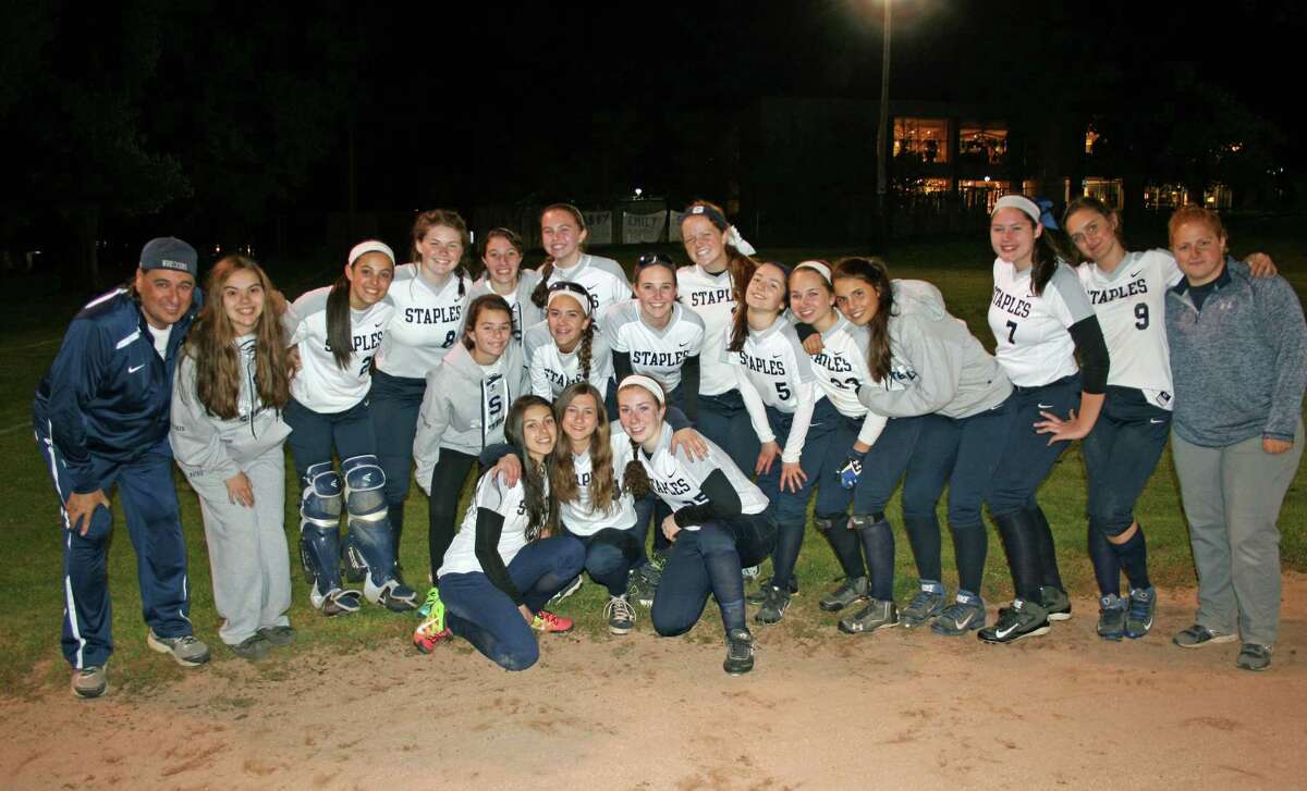The Staples softball team after defeating New Canaan on Senior Night Tuesday.