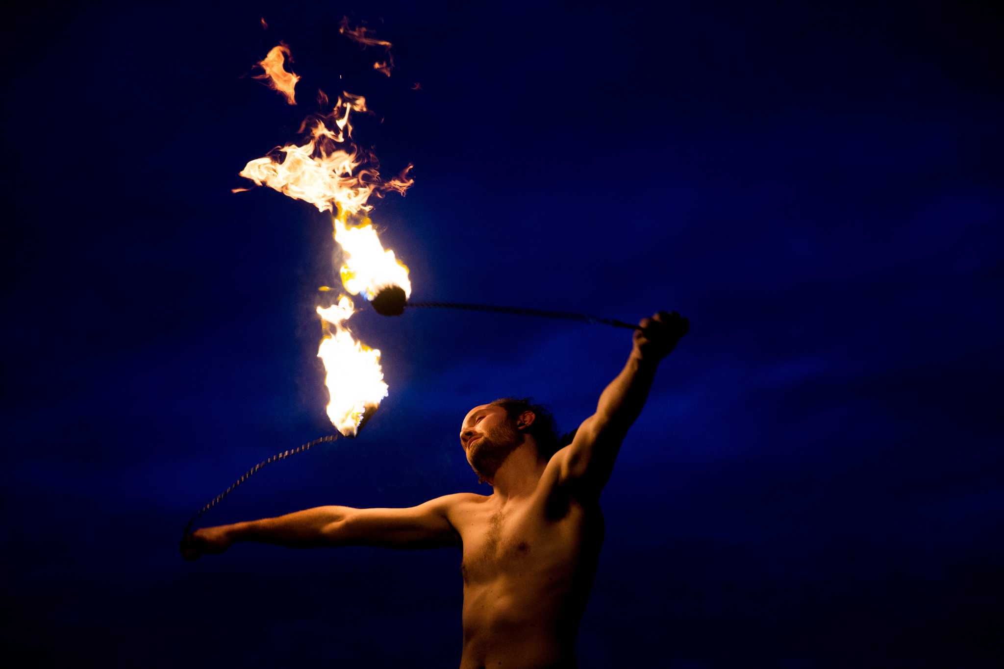Fire dancers perform at Golden Gardens Park