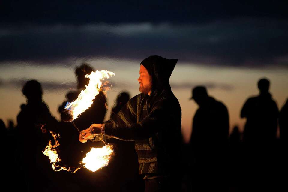 Fire dancers perform at Golden Gardens Park