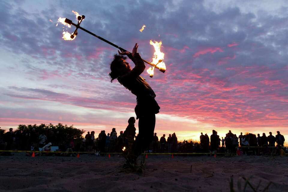 Fire dancers perform at Golden Gardens Park