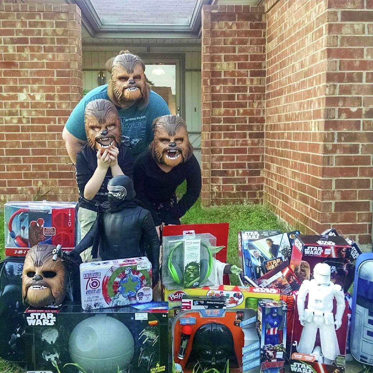 Candace Payne and her two children were surprised by Kohl's representatives with free toys after Payne's video of her trying on a Chewbacca mask went viral on Facebook.