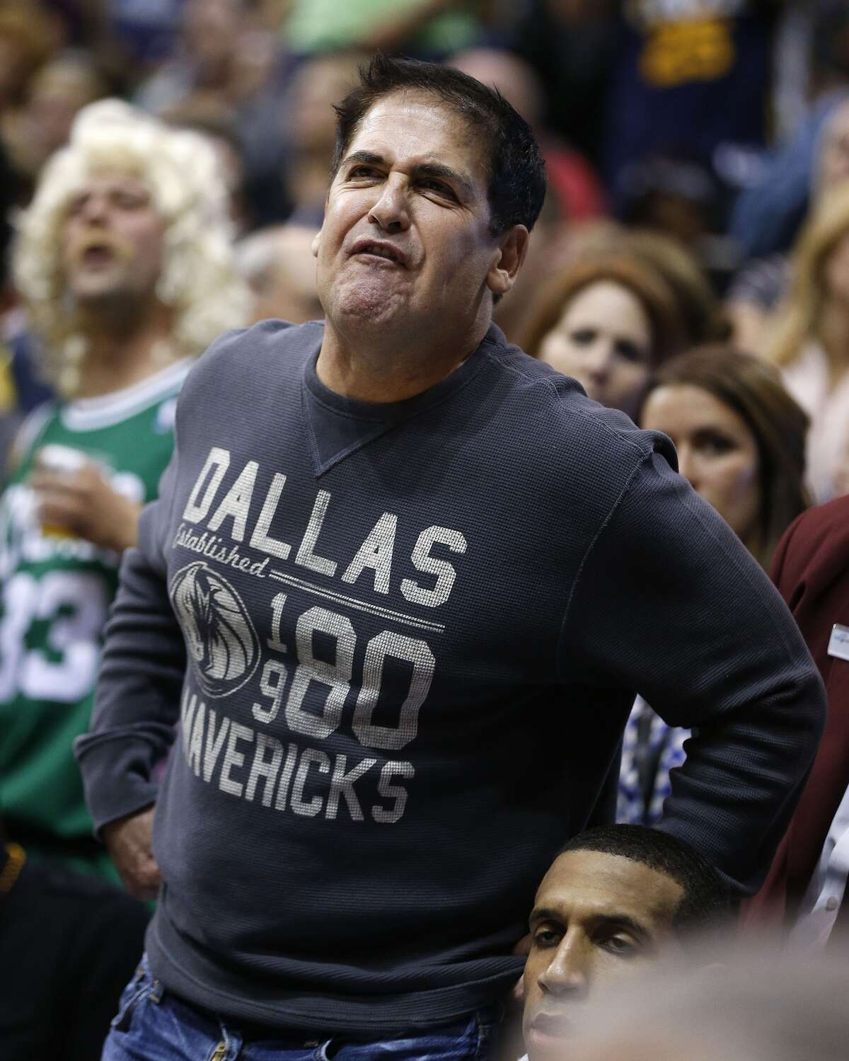 SALT LAKE CITY, UT - OCTOBER 31: Owner of Dallas Mavericks, Mark Cuban, yells at the officials during a game against the Utah Jazz during the second half of an NBA game October 31, 2012 at EnergySolution Arena in Salt Lake City, Utah. NOTE TO USER: User expressly acknowledges and agrees that, by downloading and or using this photograph, User is consenting to the terms and conditions of the Getty Images License Agreement. (Photo by George Frey/Getty Images)