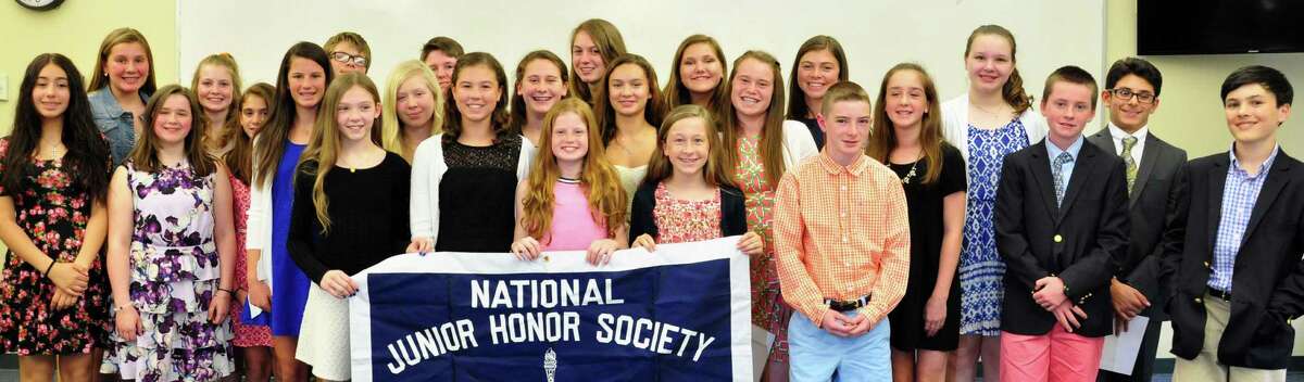Seventh-grade students at St. Thomas Aquinas School were recently inducted into National Junior Honor Society, which the school said required them to "demonstrate scholarship, service, leadership, character and citizenship while holding a 90 percent average in all academic subjects since the sixth grade." They are, front row, from left: Isadora Siguenza, Maeve McClure, Grace Furlong, Erin McHugh, Mia Parkes, Eleanor OMahony, Brady Beiser, Clare McCurley, Katherine Backus, Christina Nardone, Caleigh Peloso, Anna Paulmann, Jack Travers, Emma Prince, Finn Day and Jacob Strazza; back row: Scarlett Rollins, Teaghan Doyle, Patrick Galusha, John Patrick Banks, Caitlin May, Ava Golden, Maeve Mallow, Lauren Herley and Sebastian Machado.