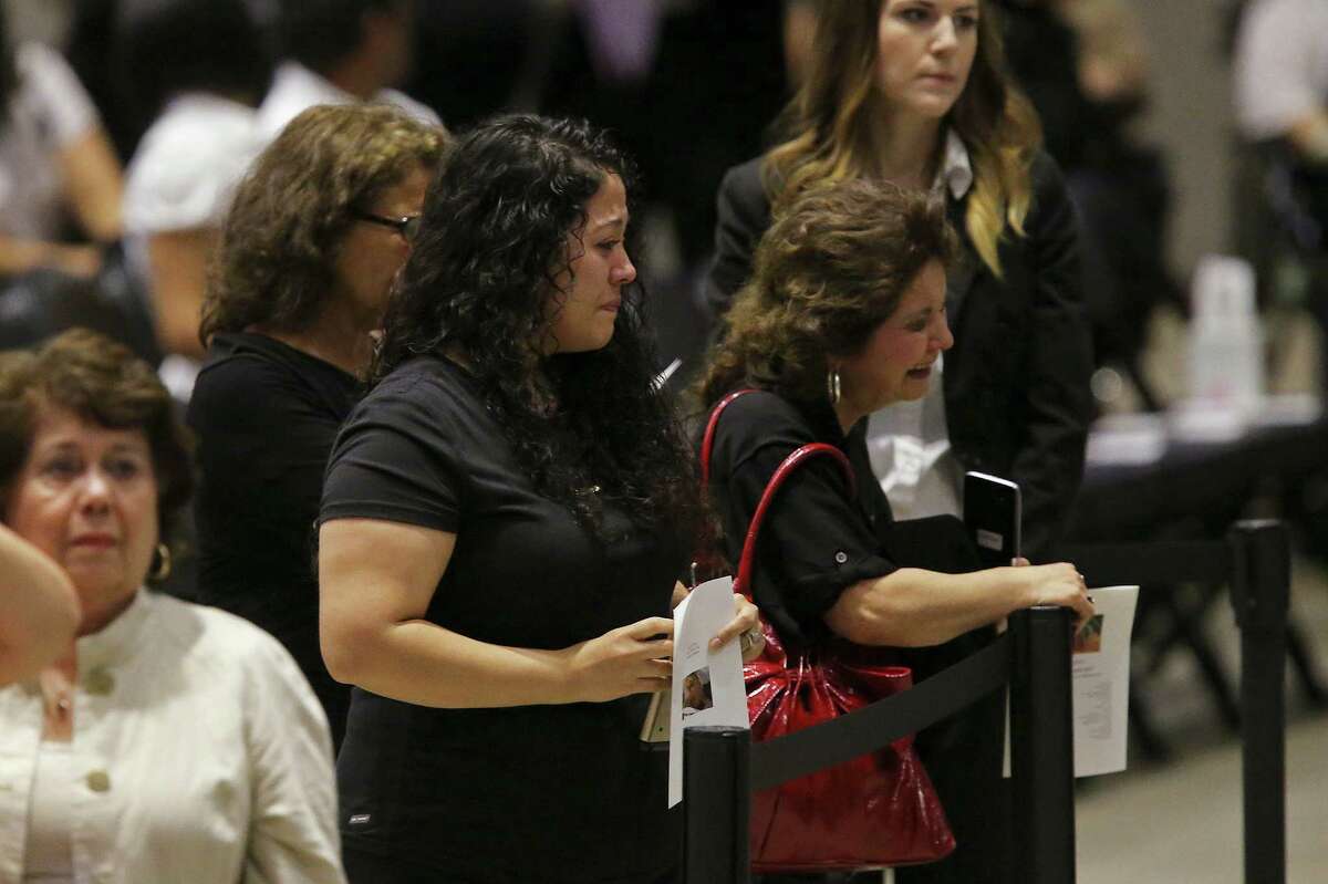 Fans react as they pay respects during a visitation and rosary for Tejano music superstar Emilio Navaira at the Freeman Coliseum, Sunday, May 22, 2016. Navaira died suddenly at his home in New Braunfels on May 16. Tens of thousands were expected to pay their respects during the viewing. A rosary was planned to 4 p.m.