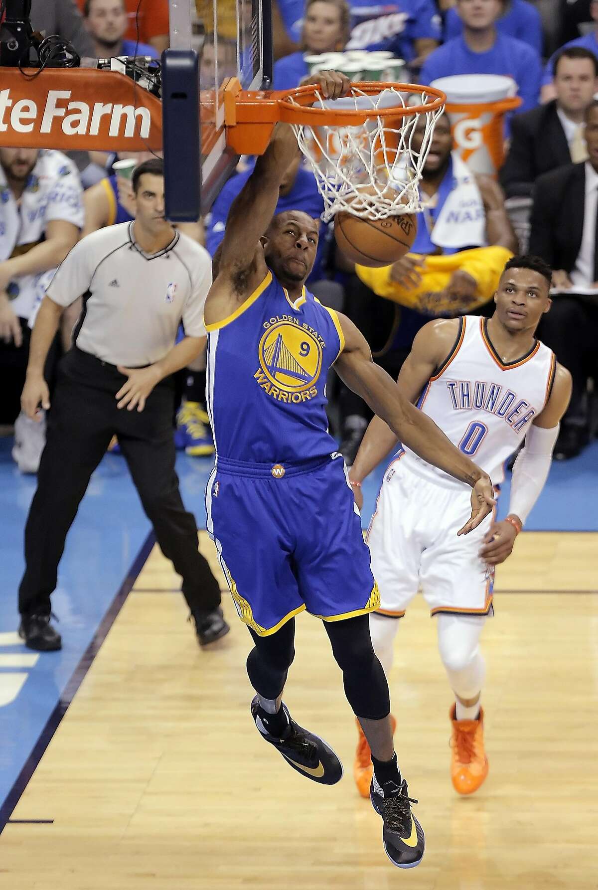 Andre Iguodala (9) dunks during the first half as the Golden State Warriors played the Oklahoma City Thunder in Game 3 of the Western Conference Finals at Chesapeake Energy Arena in Oklahoma City, Okla., on Sunday, May 22, 2016.