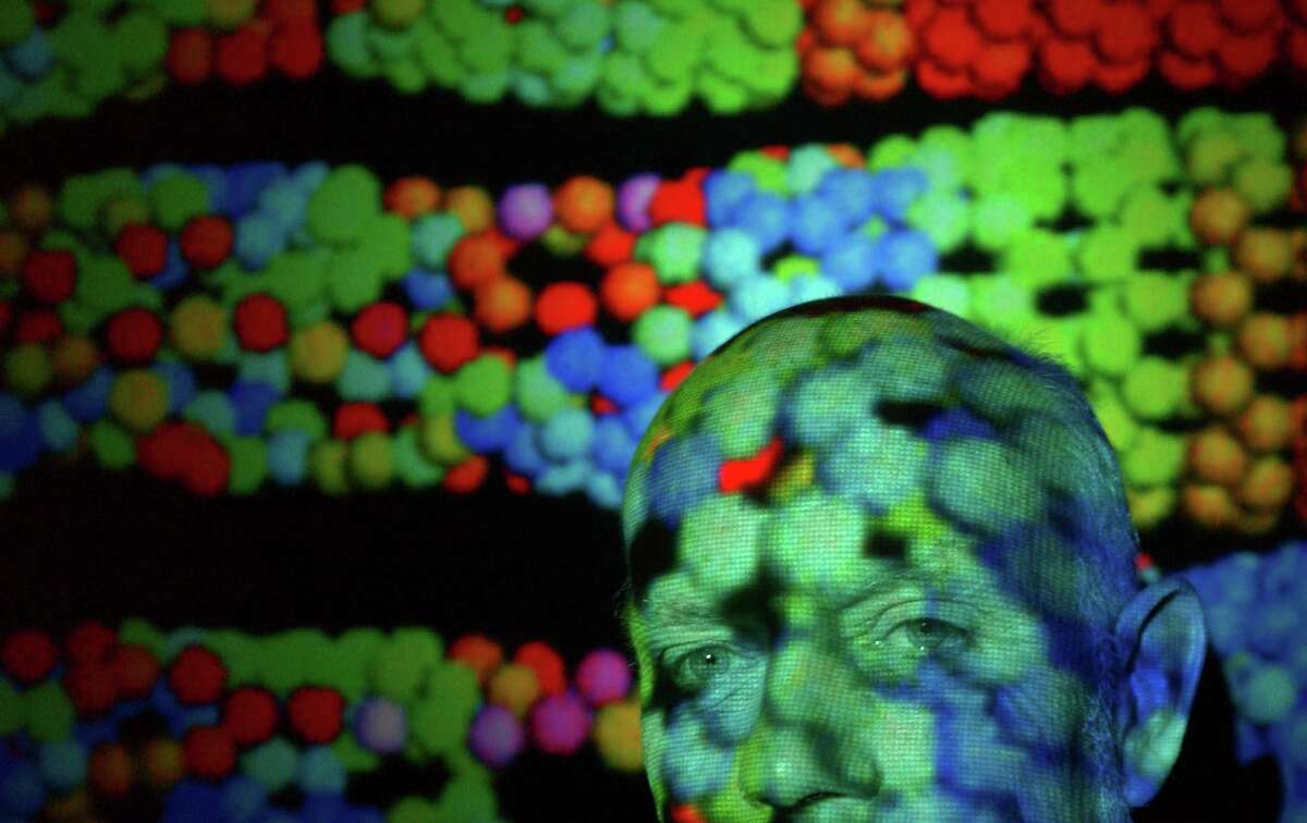 Rice University professor Richard Smalley, who leads a group researching the frontiers of nanoscience and nanotechnology. photographed Friday morning, January 31, 2003, with projections of nanotubes. (Smiley N. Pool/Chronicle)
