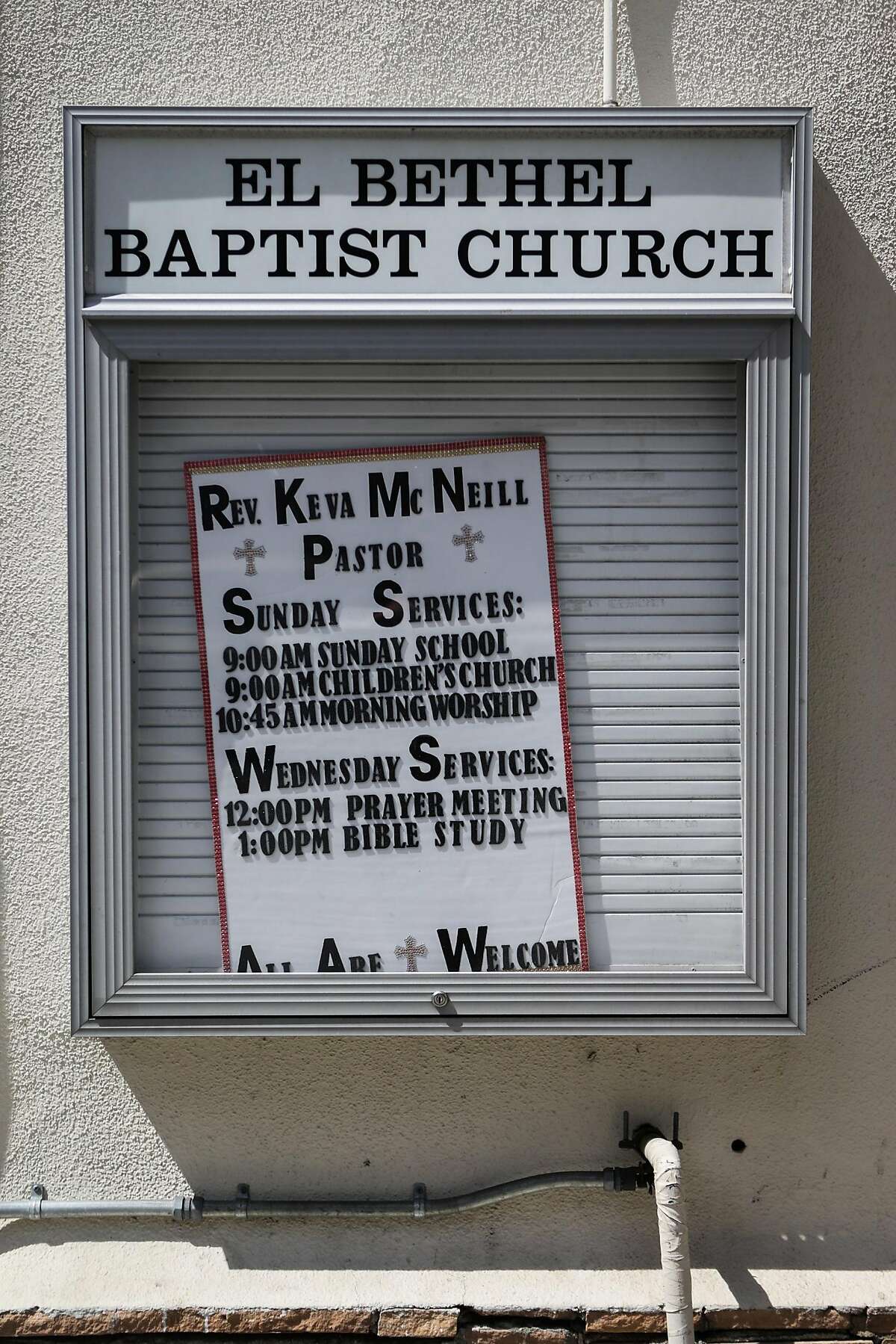A sign for services hours at El Bethel Church can be seen outside the Church in San Francisco, California, on Thursday, May 19, 2016.