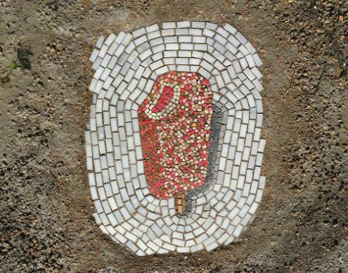 “Strawberry Shortcake,” 2158 W 18th Place, Chicago. (For more of Jim Bachor's pothole art, scroll through the gallery.)