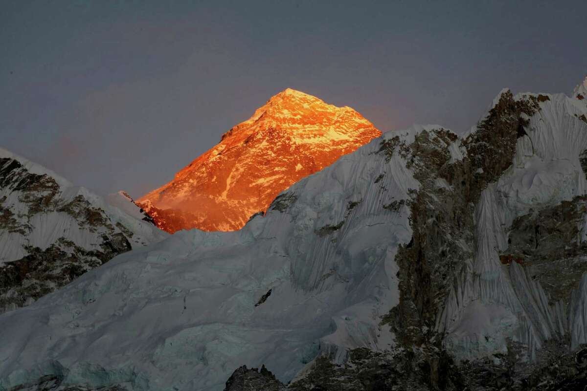 FILE - In this Nov. 12, 2015, file photo, Mt. Everest is seen from the way to Kalapatthar in Nepal. An Indian climber has died while being helped down Mount Everest, just a couple of days after a Dutch and an Australian died near the peak. Two other Indian climbers are missing, and experts say some of the tragedy may have been avoidable. (AP Photo/Tashi Sherpa, File)