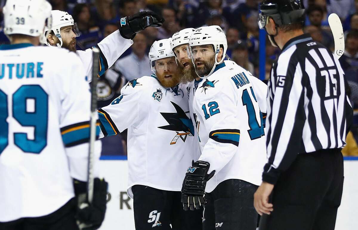 ST LOUIS, MO - MAY 23: Joe Pavelski #8 of the San Jose Sharks celebrates with Joe Thornton #19, Patrick Marleau #12 and Brent Burns #88 after scoring a second period goal against the St. Louis Blues in Game Five of the Western Conference Final during the 2016 NHL Stanley Cup Playoffs at Scottrade Center on May 23, 2016 in St Louis, Missouri. (Photo by Jamie Squire/Getty Images)