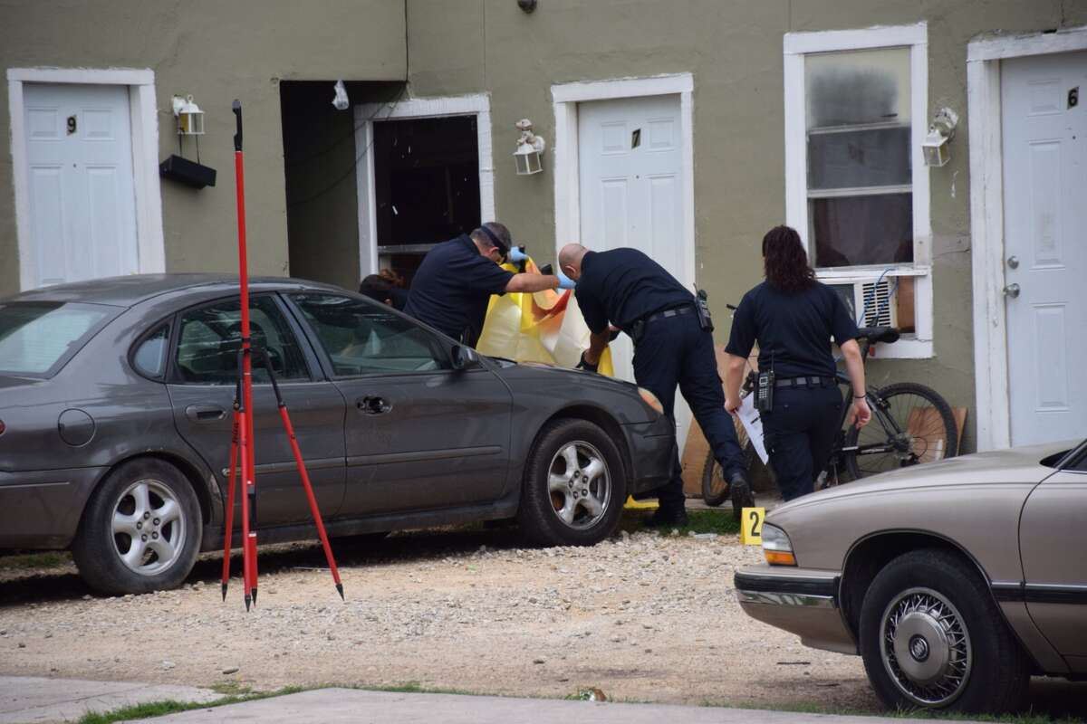 SAPD investigates a shooting scene in the 2300 block of East Houston Street that left one man dead on the East Side Tuesday morning, May 24, 2016.