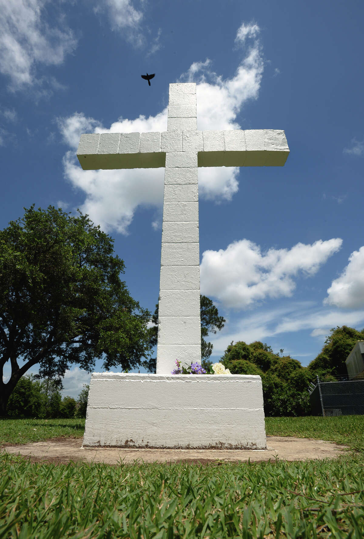 Citing that the public should have a clearer distinction of city property and church property, the Freedom From Religion Foundation is asking the City of Port Neches to fence around the newly sold section of Port Neches park containing a statue of a cross. The cross has been a topic of debate since November when the organization requested its removal on grounds of separation of church and state. Photo taken Monday, May 23, 2016 Guiseppe Barranco/The Enterprise