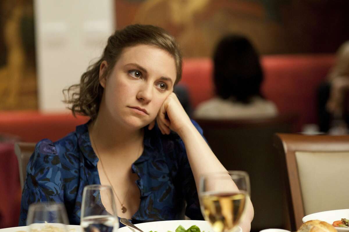 This undated image released by HBO shows Lena Dunham in a scene from the series "Girls." Dunham was nominated for a Golden Globe for best actress in a comedy series, Thursday, Dec. 13, 2012, for her role in "Girls." The 70th annual Golden Globe Awards will be held on Jan. 13. (AP Photo/HBO, JoJo Whilden)