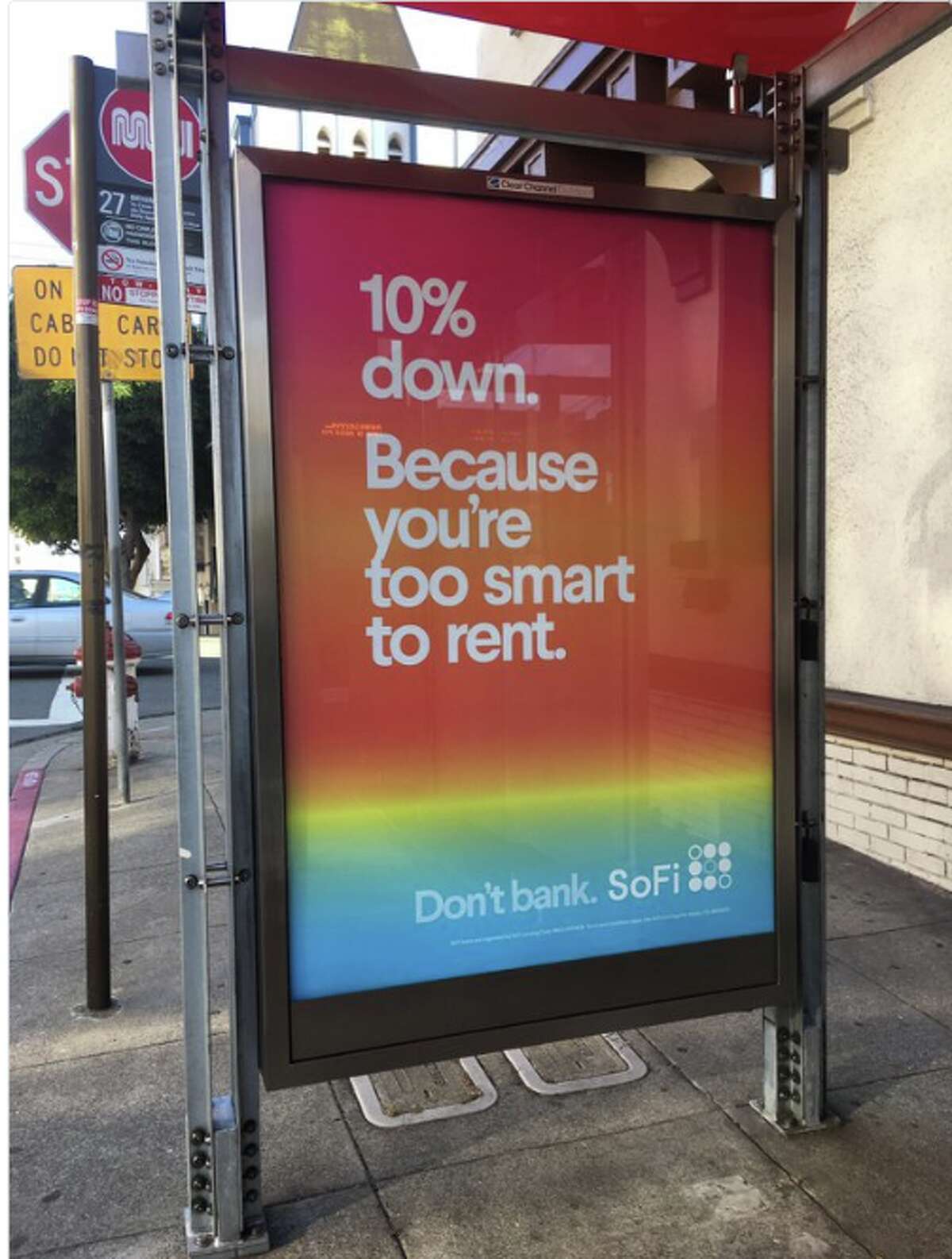 An ad for SoFi appearing on the sides of bus stops around San Francisco basically calls anyone who rents stupid—and many aren't happy about this.