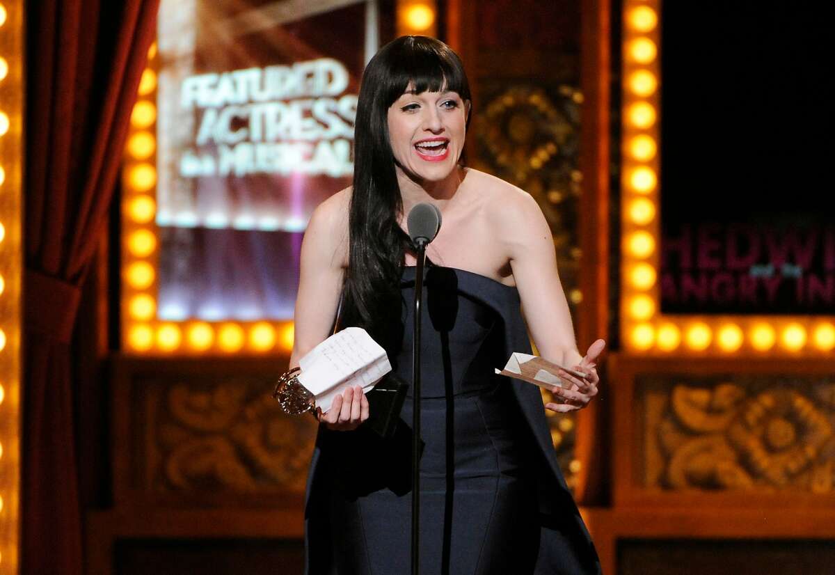 Lena Hall accepts the award for best performance by an actress in a featured role in a musical for "Hedwig and the Angry Inch" on stage at the 68th annual Tony Awards at Radio City Music Hall on Sunday, June 8, 2014, in New York. (Photo by Evan Agostini/Invision/AP)