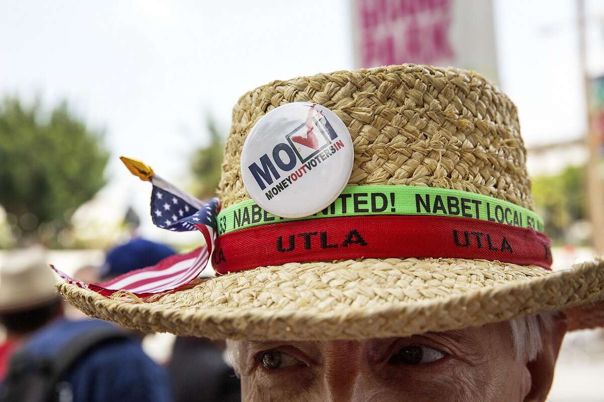 A participant in a protest after a court decision ruled teacher tenure laws unconstitutional, in Los Angeles, June 10, 2014. The landmark ruling by Judge Rolf Treu of Los Angeles County is likely to lead to a flood of copycat suits in other states, shifting the battleground on the issue from the legislatures to the courts. (Monica Almeida/The New York Times)