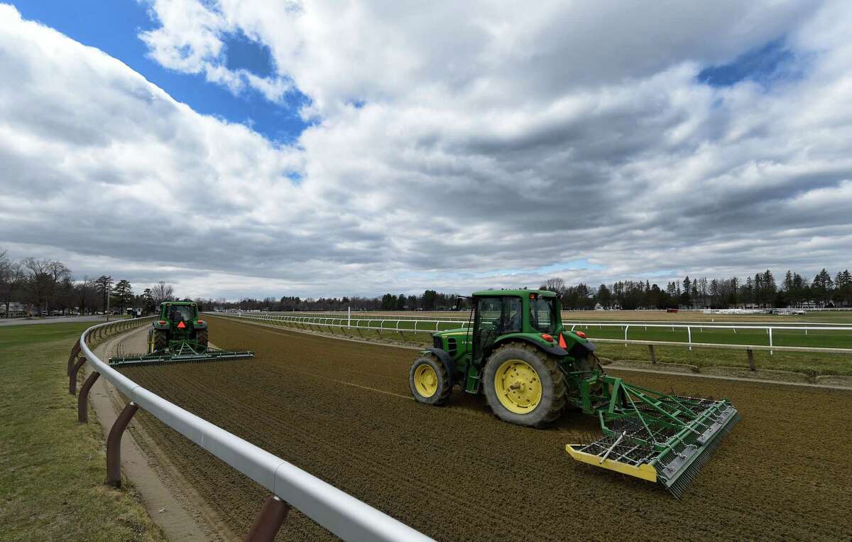 Tractors harrow the Oklahoma Training Center track across from Saratoga Race Course on Tuesday, April 12, 2016, in Saratoga Springs, N.Y. (Skip Dickstein/Times Union)