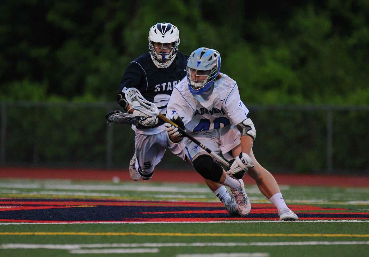 FCIAC semi-final lacrosse action between the Darien Blue Wave and the Staples Wreckers at Brien McMahon High School on May 24, 2016 in Norwalk, Connecticut.