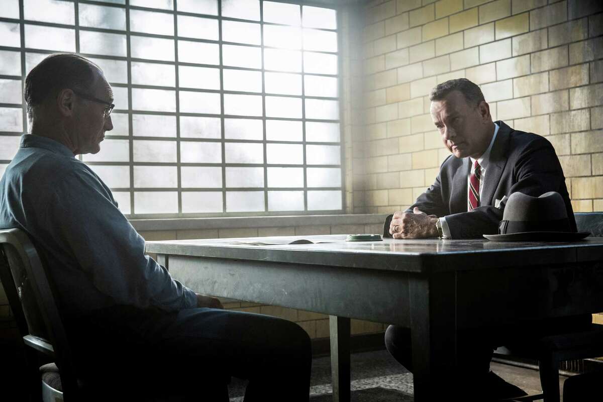 In this image released by Disney, Mark Rylance, left, and Tom Hanks appear in a scene from "Bridge of Spies." (Jaap Buitendijk/DreamWorks Pictures/Fox 2000 PIctures via AP)