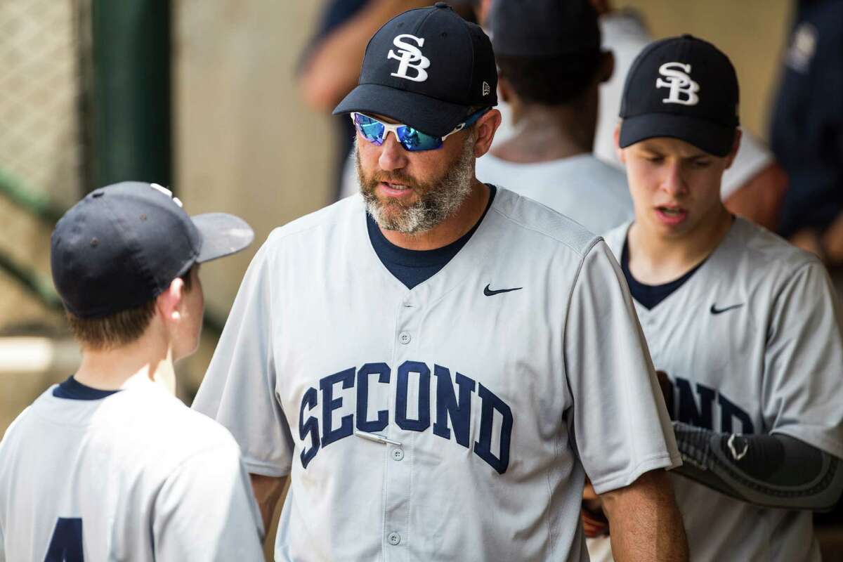 Second Baptist head coach Lance Berkman, center, is one of the candidates to replace Wayne Graham at Rice. Browse through the slideshow for a look at the other potential candidates.