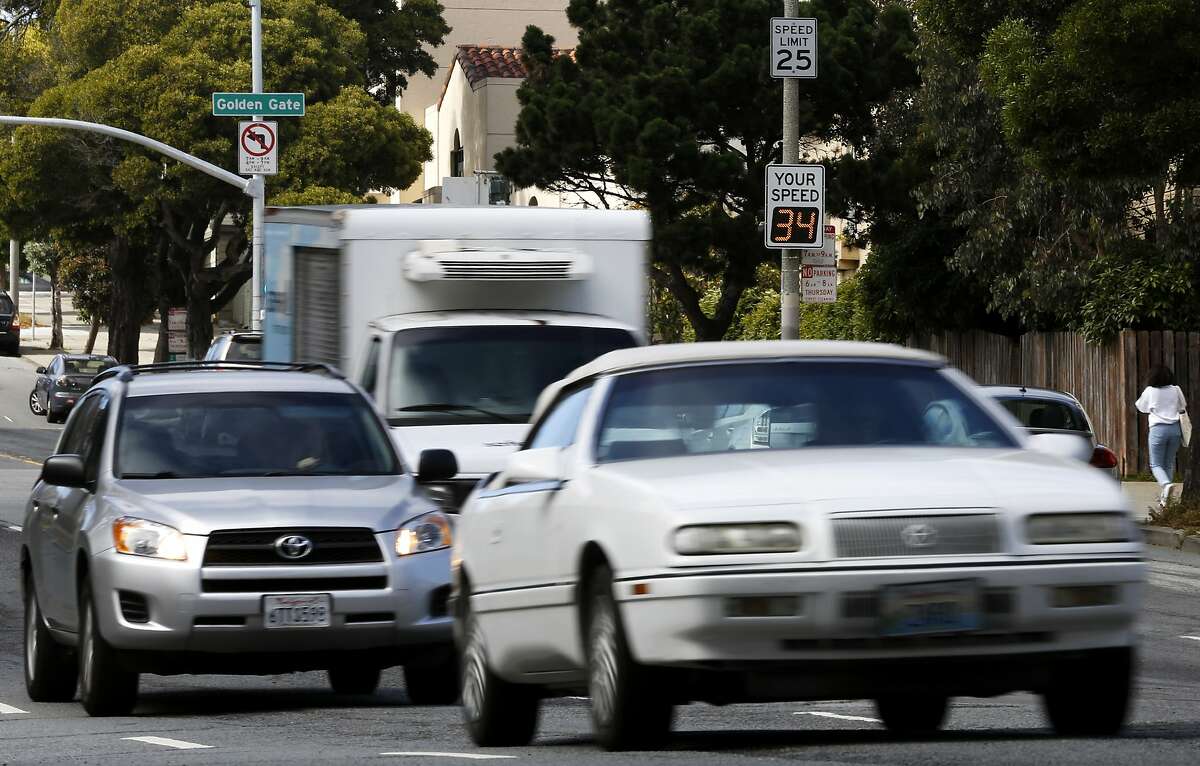 Cars speed on Masonic Avenue between Fell Street and Geary Boulevard in San Francisco, California, on Wednesday, May 25, 2016.