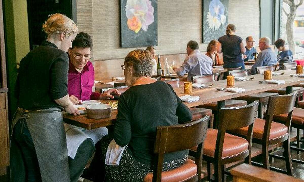 People dining at Aster.