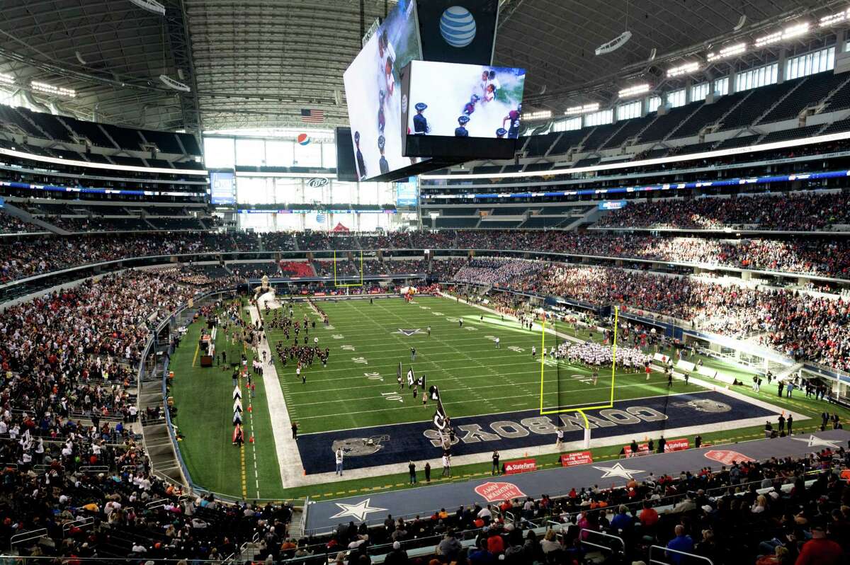 Pearland players take the field to face Allen in the Class 5A Division I state football championship game at AT&T Stadium on Dec. 21, 2013, in Arlington.