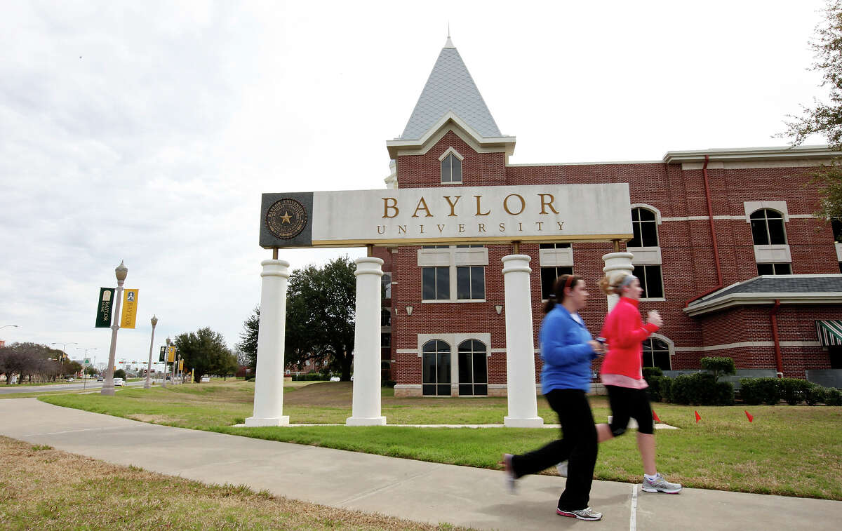 Students jog around the Baylor University campus Sunday Feb. 12, 2012 in Waco.