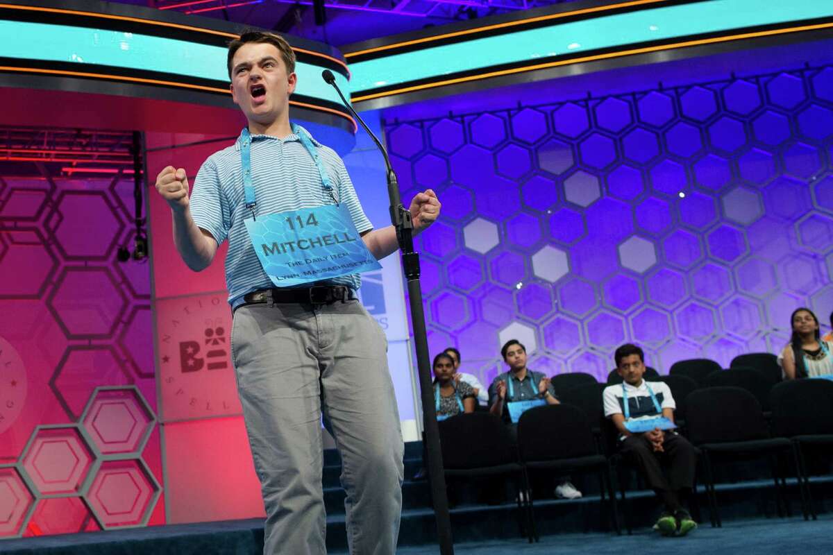 Mitchell Robson, 14, of Danvers, Mass. reacts to correctly spelling his word during the final round of the Scripps National Spelling Bee in National Harbor, Md., Thursday, May 26, 2016.