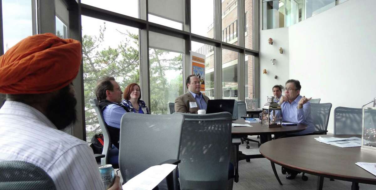Alan Brody, right, leads a workshop on May 24, 2016 on how entrepreneurs should handle initial meetings with 'angel' investors, at Workpoint in Stamford, Conn. Brody is president of Convean, which hosts events for entrepreneurs including the annual Angel Week NY in New York City.