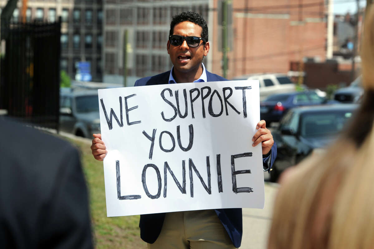 Dennis Bradley leads a protest in front of Bridgeport Police Headquaters, in Bridgeport, Conn. May 26, 2016. Bradley, President of the Bridgeport Board of Education, and others gathered to express their support for Bridgeport Police Lt. Lonnie Blackwell, who was meeting with Chief Armando Perez potention termination.