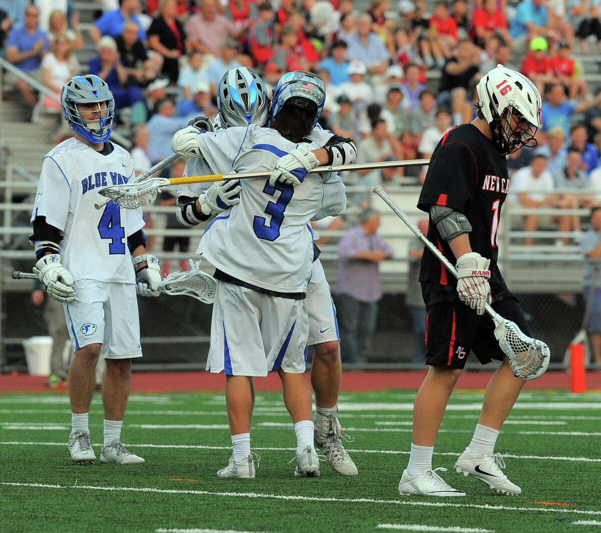 Darien Colin Minicus (3) celebrates a first half goal against New Canaan in a FCIAC Boys Lacrosse Final at Brien McMahon High School in Norwalk, Conn. on May 26, 2016.