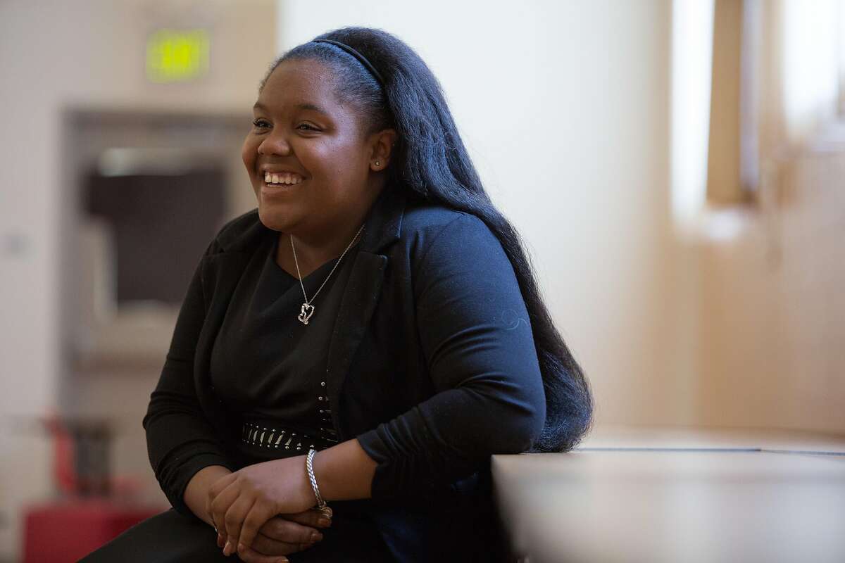 Da'Nille Lemon, age 14, an 8th grade student at Dr. Martin Luther King, Jr. Academic Middle School, poses for a photo on Thursday, May 26, 2016 in San Francisco, Calif. Lemon designated a table in the school cafeteria, The No-Flex Zone, where harassment and bullying are not allowed. She and fellow students enforce the zone. The The Community Board named Lemon the recipient for the Gail Sadalla Rising Peacemaker Award.