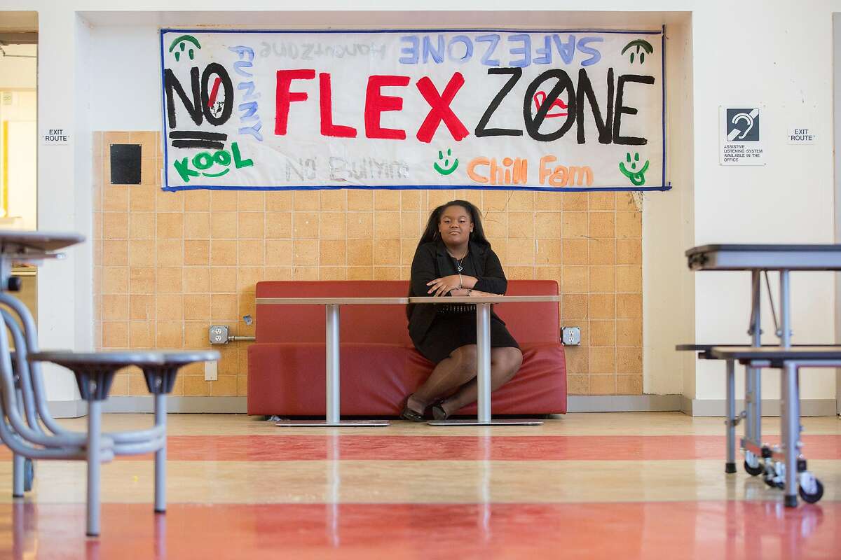 Da'Nille Lemon, age 14, an 8th grade student at Dr. Martin Luther King, Jr. Academic Middle School, poses for a photo on Thursday, May 26, 2016 in San Francisco, Calif. Lemon designated a table in the school cafeteria, The No-Flex Zone, where harassment and bullying are not allowed. She and fellow students enforce the zone. The The Community Board named Lemon the recipient for the Gail Sadalla Rising Peacemaker Award.