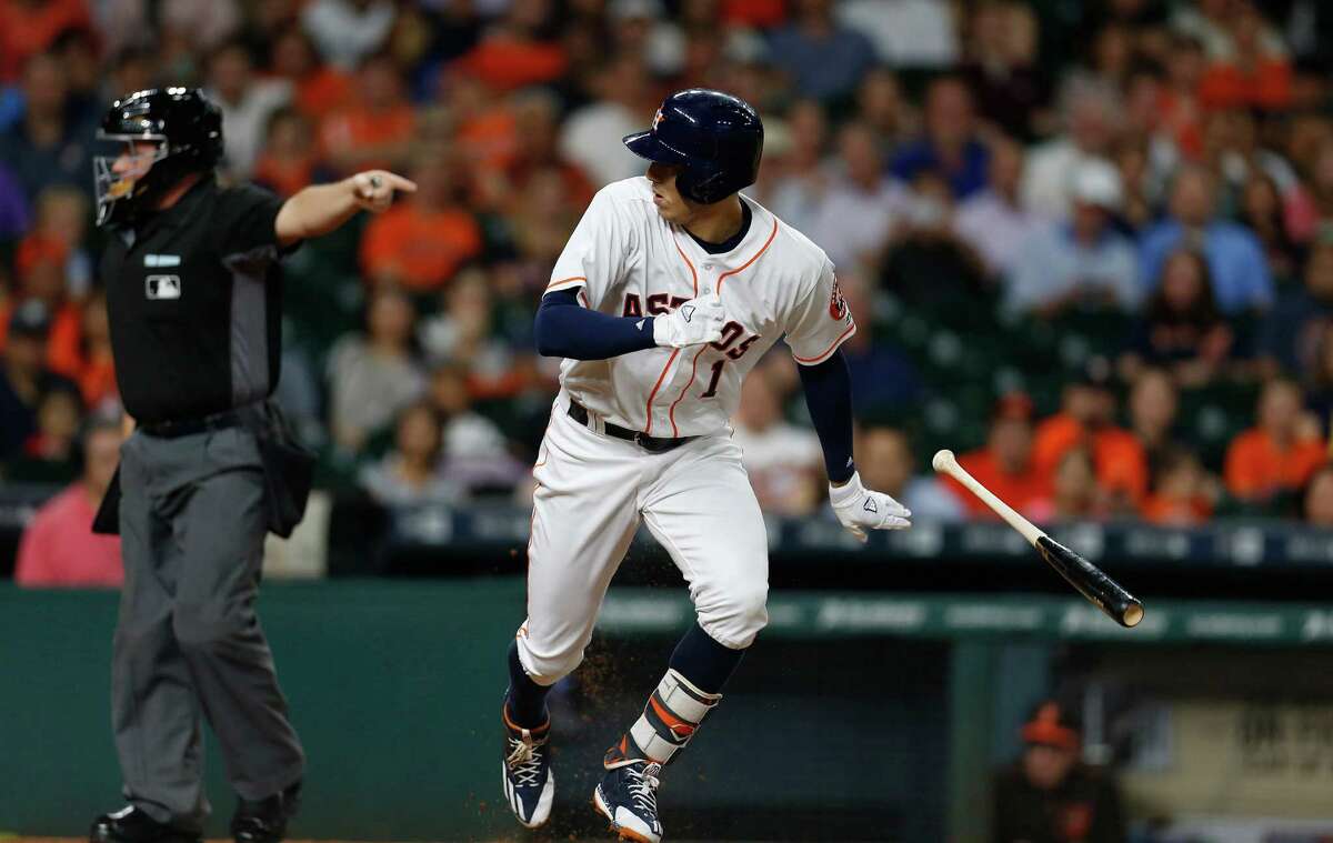 Houston Astros shortstop Carlos Correa (1) looks back as he struck out in the first inning of an MLB baseball game at Minute Maid Park,Thursday, May 26, 2016. ( Karen Warren / Houston Chronicle )