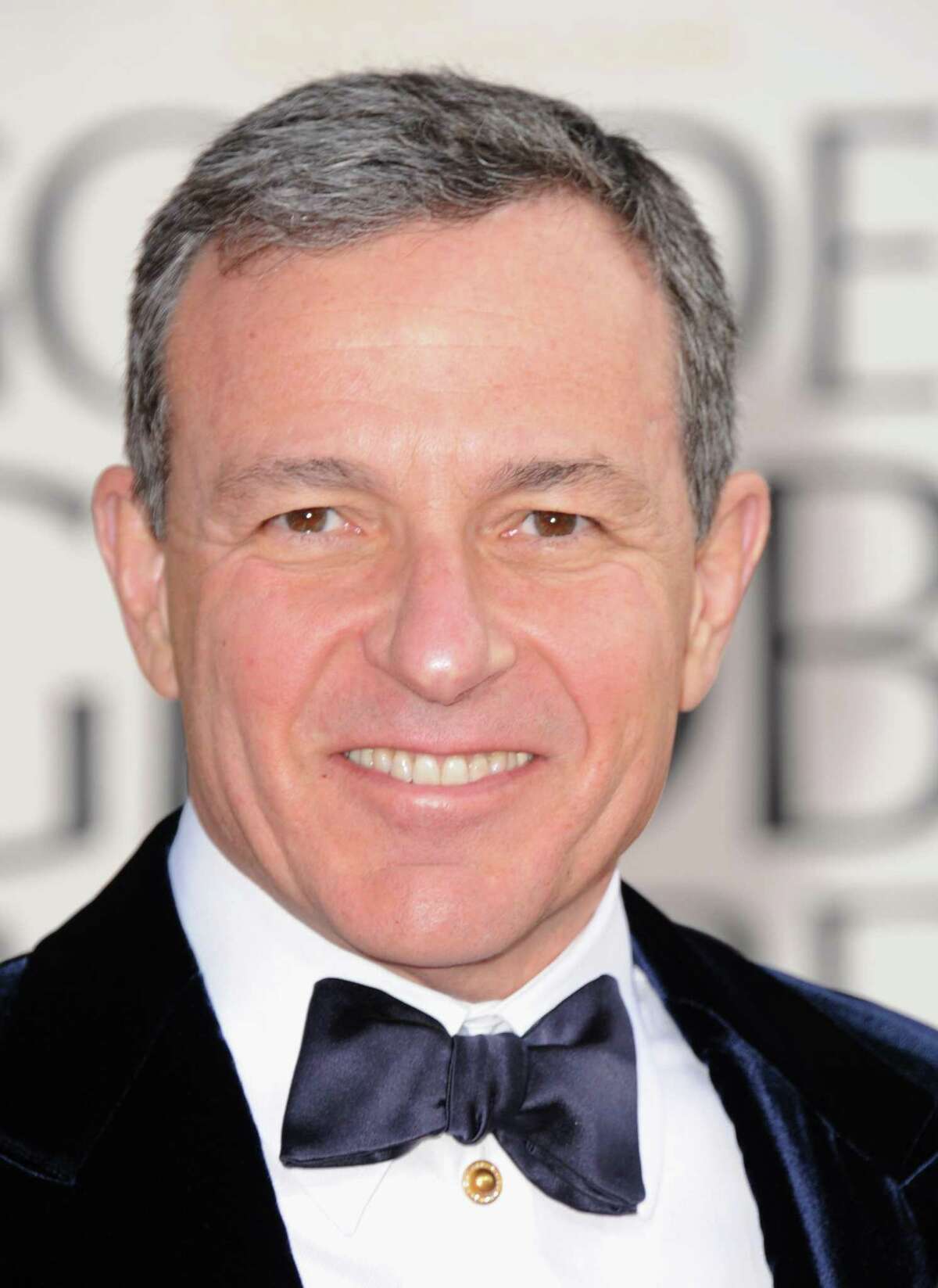 Walt Disney Co. CEO Robert Iger said he plans to stay on a presidential advisory panel after activists at the company’s annual shareholder meeting Wednesday asked him to step down from the position.