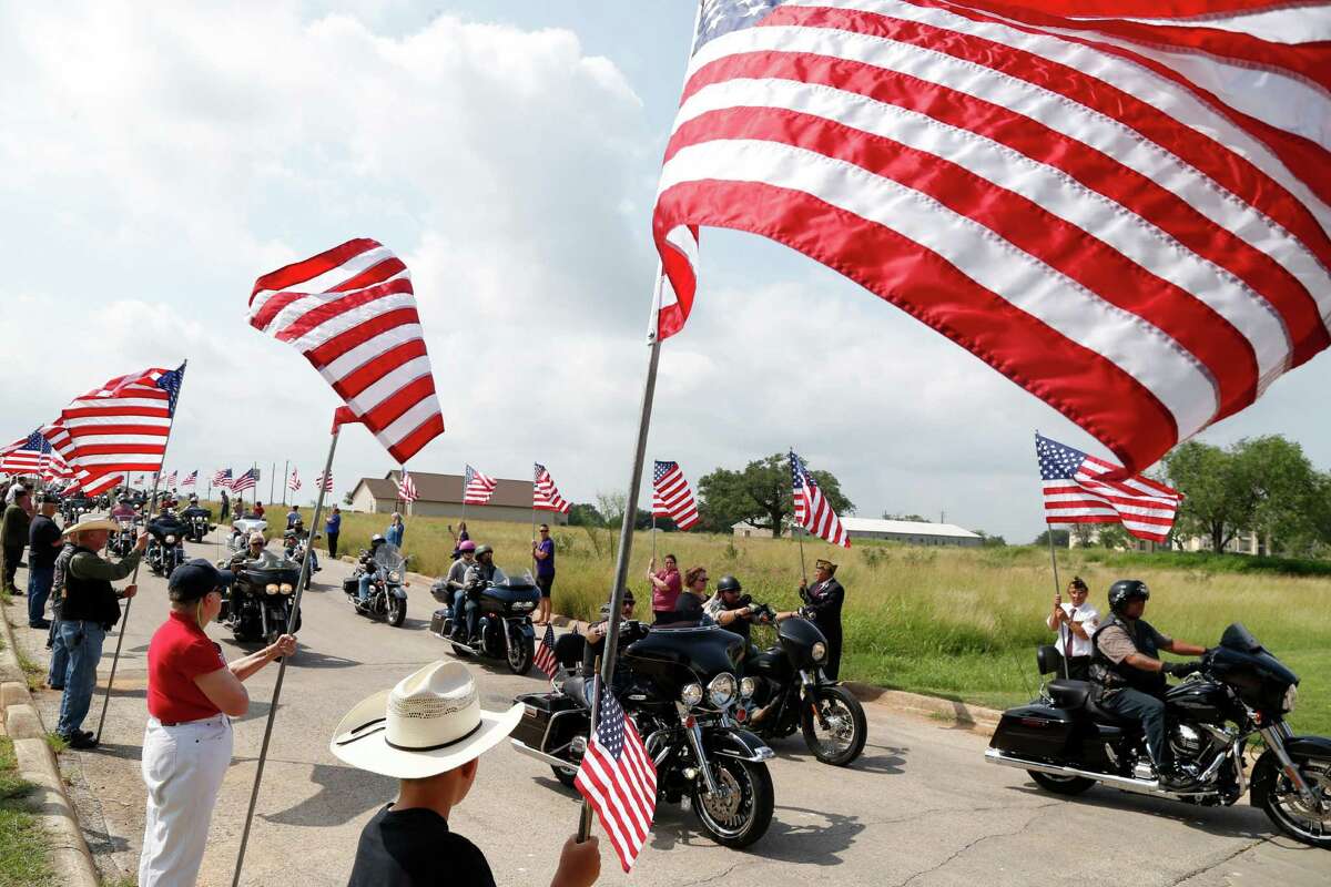 People stand with Flags on the road as the bikers enter the Home. Participating motorcycle organizations are Sovereign Sons of San Antonio MC, Combat Vets Chapter 23-3 and Auxiliary, Soldiers for Jesus MC, Fallen Saints MC of San Antonio, Patriot Guard Riders, Air Force Sergeants Association, Combat Vets Association and the Green Knights. We anticipate more than 500 people will attend this event to honor our local veterans at Frank M. Tejeda Texas State Veterans Home in Floresville on Saturday, May 28,