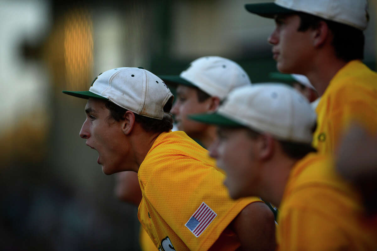 Little Cypress-Mauriceville players heckle Jasper's pitcher from the dugout in the Class 4A Region III semifinals on Saturday evening. Photo taken Saturday 5/28/16 Ryan Pelham/The Enterprise