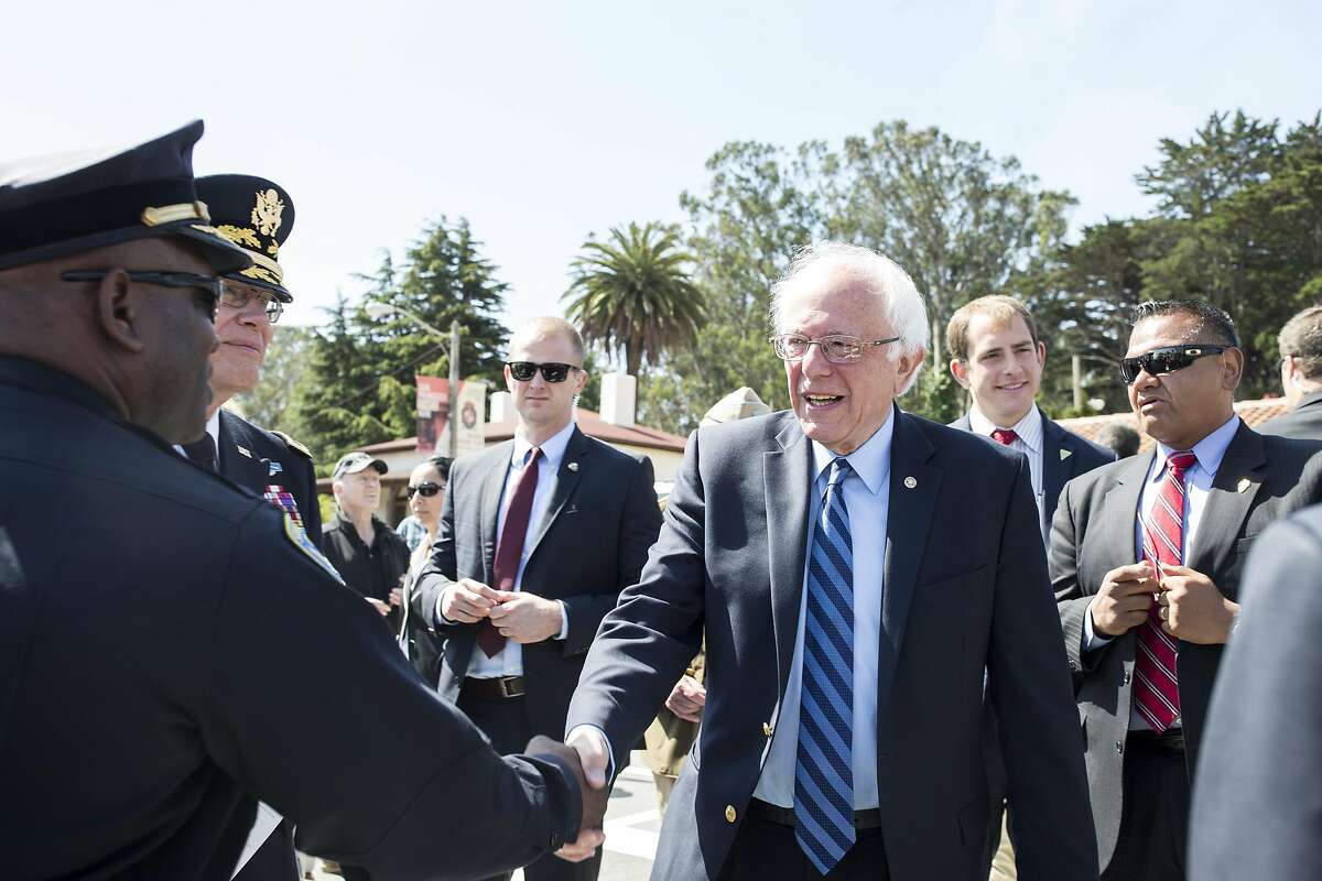 Bernie Sanders, a candidate for the Democratic nomination for President of the United States, shakes hands while attending the annual Memorial Day Ceremony at the San Francisco National Cemetery in the Presidio in San Francisco, Calif., on Monday, May 30, 2016.