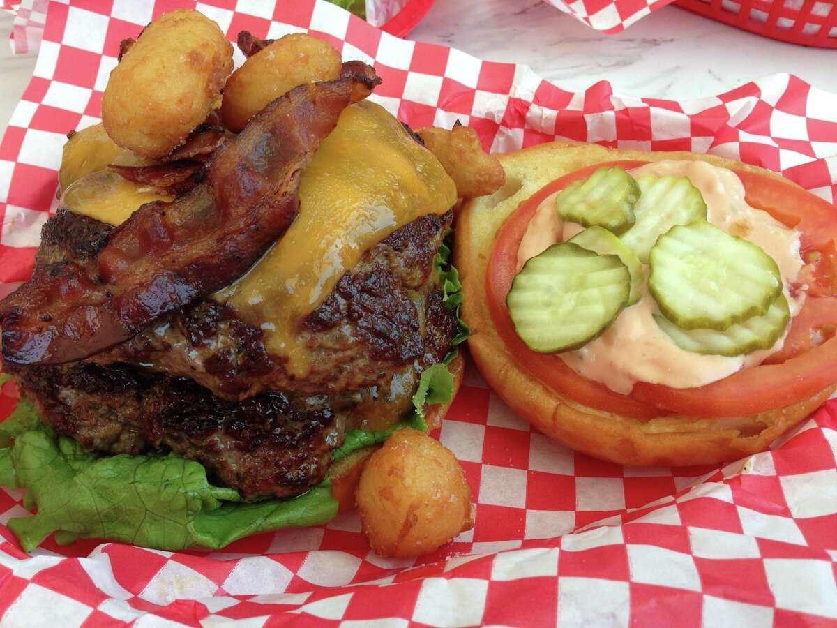Scenes from the opening of Killen's Burgers, 2804 S. Main St., Pearland, on May 28. Shown: Burgers