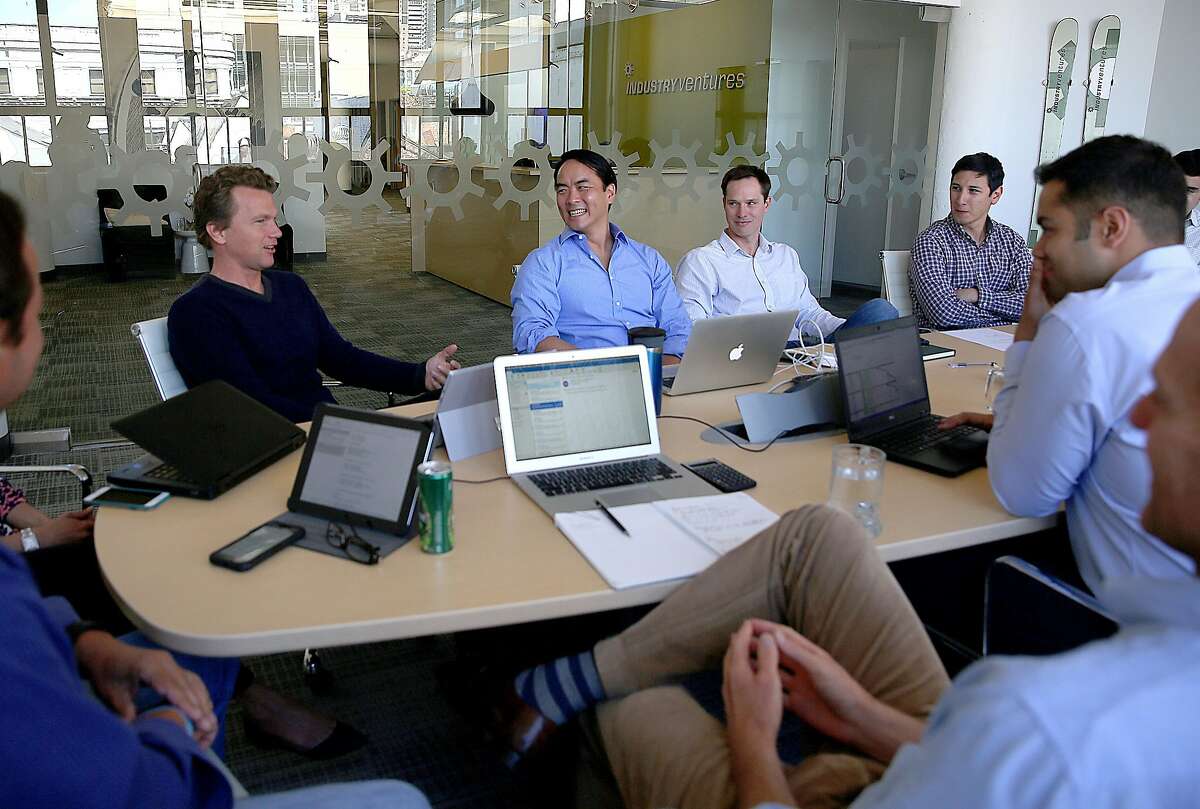 Founder and CEO Hans Swildens (left with black shirt) of Industry Ventures has a meeting with partners and staff on Monday, May 30, 2016 in San Francisco, Calif.
